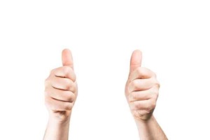 Hand showing thumbs up. All on white background.